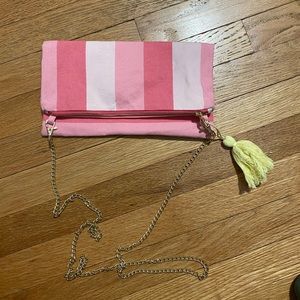 Clutch with removal strap